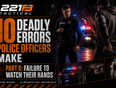 Police officer watching a suspect's hands during a street encounter for officer safety