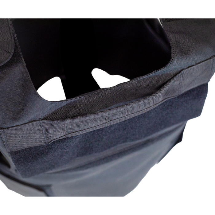 Close-up of a black tactical vest's emergency drag handle 5