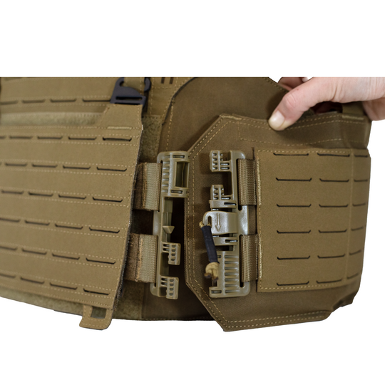 cummerbund detached from front of  tan carrier, detach by pulling the strap downward 7