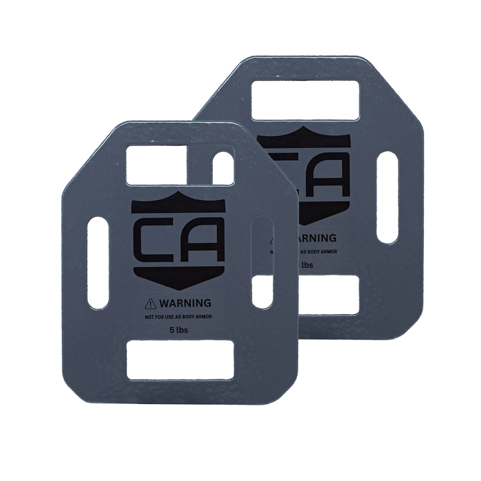 pair of grey weighted training plates weighing 5 pounds a piece 0