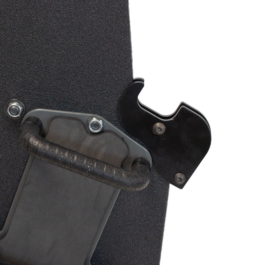 back of ballistic shield with universal weapon support bracket bolted on it 8