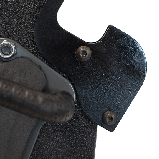 Close-up of a black handgun or rifle rest bracket that is able to be bolted onto most ballistic shields 10