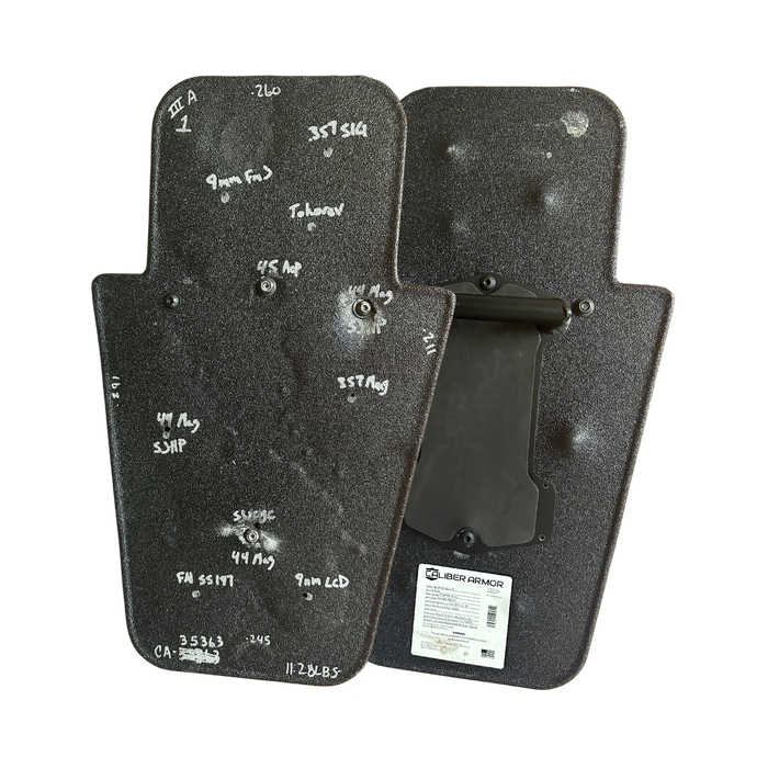 Caliber Armor Level IIIA HG2 Ballistic shield that has been shot for testing purposes, showing no rounds pierced the shield's surface 3