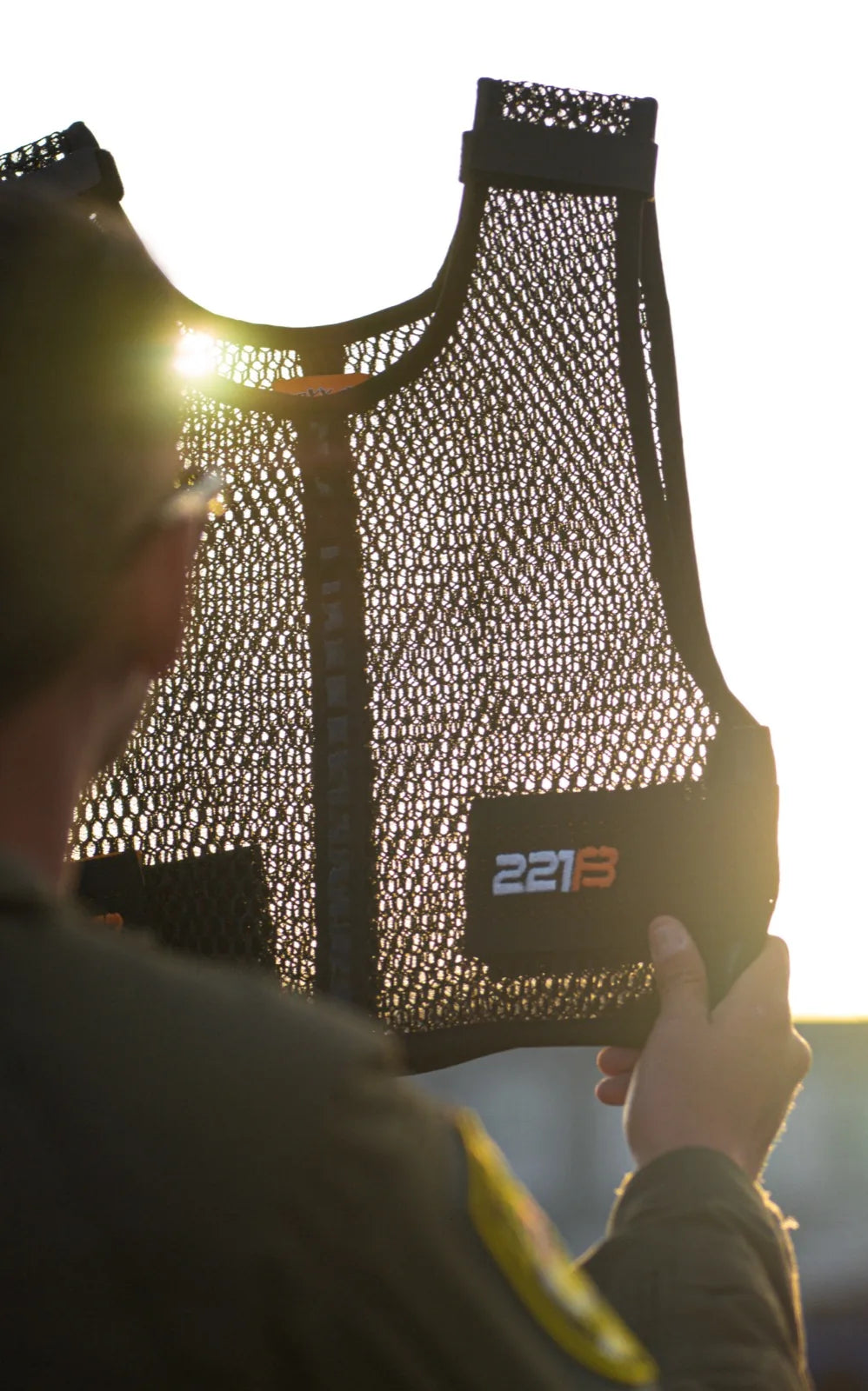 Light passing through the open-weave mesh